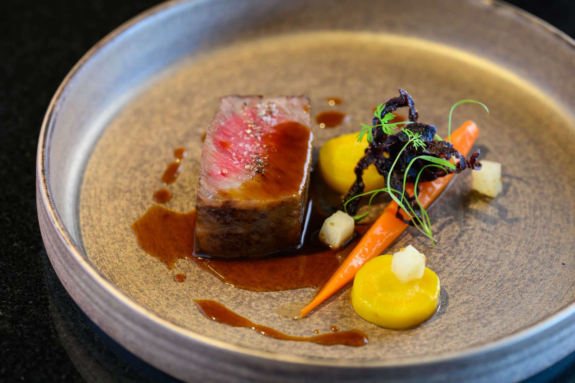 Roasted Ōmi beef with colourful carrots and yuzu pepper sauce